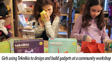 Girls using Teknikio to design and build gadgets at a community workshop