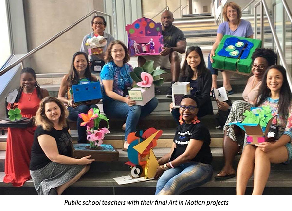 Public School teachers with their final art in motion projects