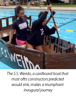 The S.S. Weirdo, a cardboard boat that most ofits constructors predicted would sink, makes a triumphant inaugural journey
