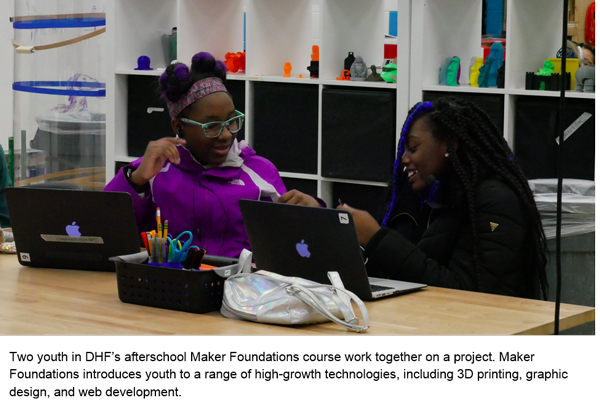 Two youth in DHF's afterschool Maker Foundations course work together on a project. Maker Foundations introduces youth to a range of high-growth technologies, including 3D printing, graphic design, and web development.